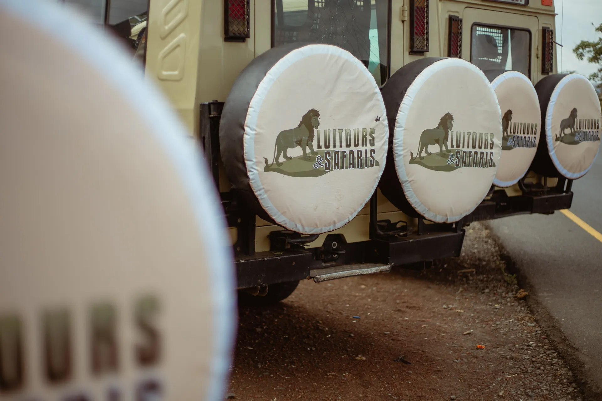 Safari vehicle travelling through a Tanzania wildlife area